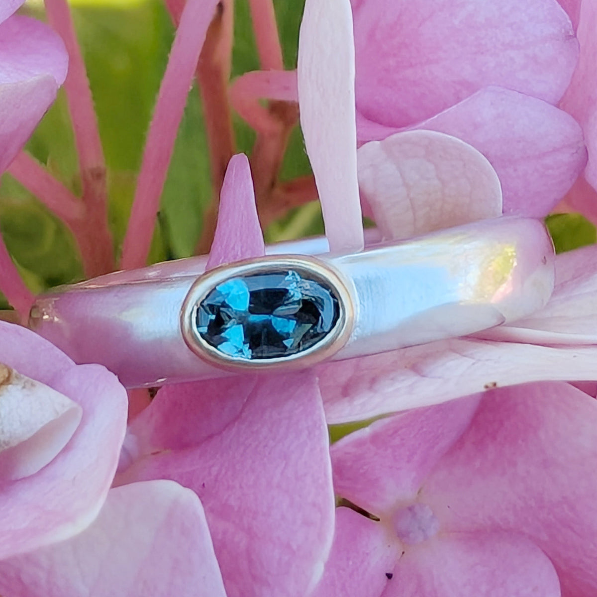 18K Bezel, Oval Montana Sapphire and Argentium silver band
