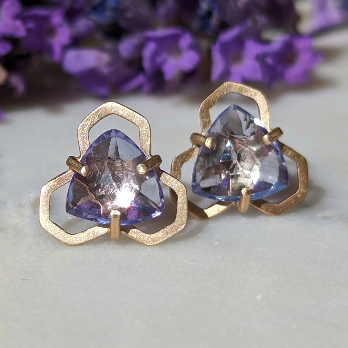 14k honey studs with trillion rose cut tanzanites